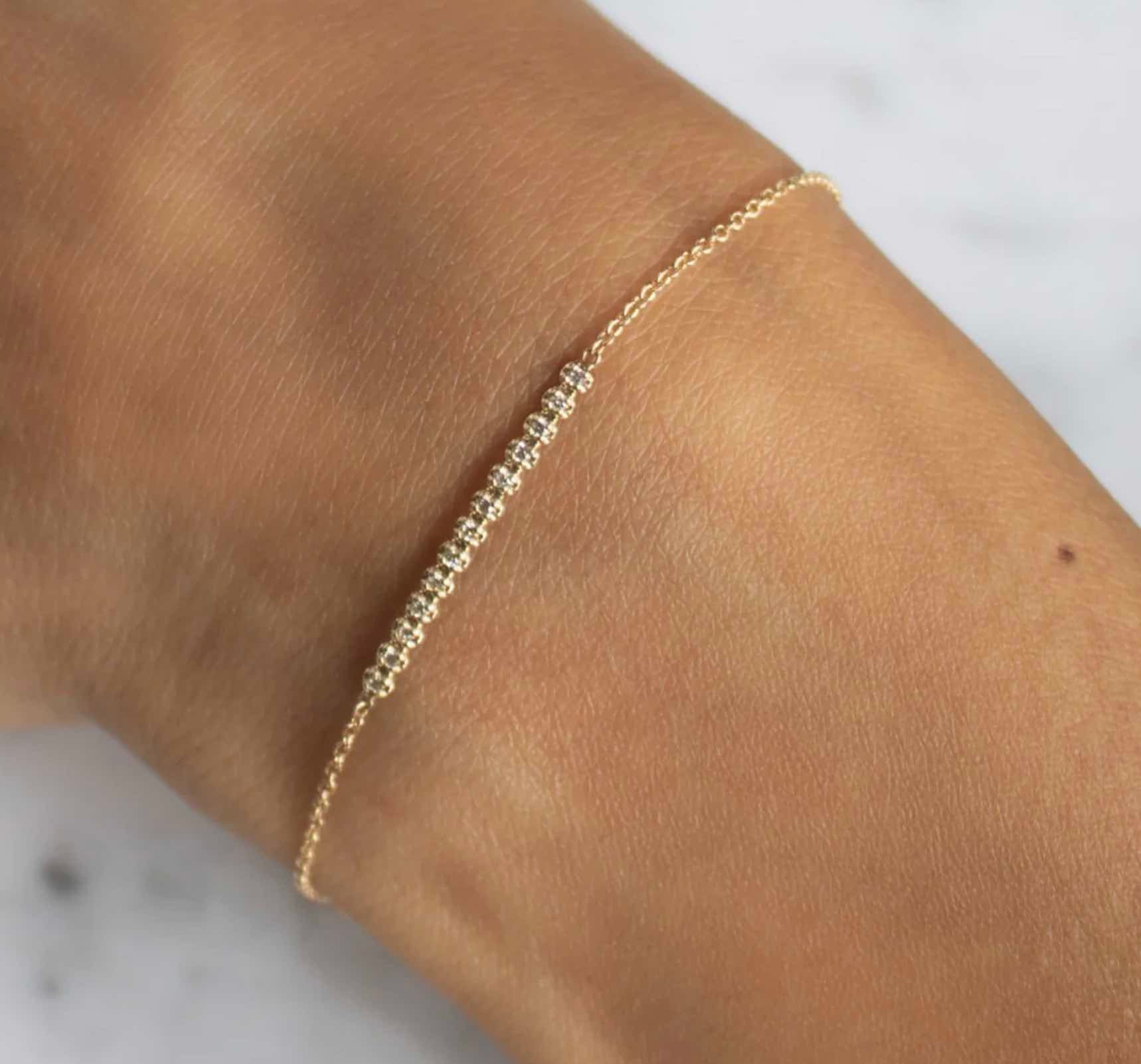 Delicate diamond bar bracelet on model - Camille Jewelry