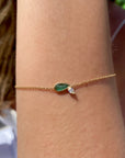 Diamond Emerald Bracelet – 14K Gold pear shaped Jewelry on models wrist- Camille Jewelry
