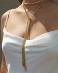 Anuket Gold Scarf Necklace knotted chains to front on model– Versatile Layered Fashion Jewelry - Camille Jewelry