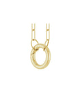 Circle charm holder necklace in 14K yellow gold with a hinged ring pendant on a white background in an angled view by Camille Jewelry