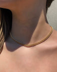 Woman wearing a gold filled curb chain link necklace in 14K gold filled by Camille Jewelry