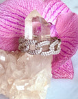 Sterling Silver Curb Chain Pavé Ring on a quartz display with orchid flower– Semi-Fine Statement Jewelry - Camille Jewelry