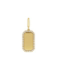 Back view of a diamond dog tag charm in 14K yellow gold engraved by Camille Jewelry