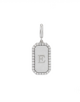 Engravable diamond dog tag charm in 14K white gold with a natural diamond halo border on a white background by Camille Jewelry