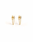 Diamond studs with locking backs in 14K yellow gold with marquise silhouette on a white background by Camille Jewelry