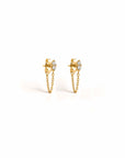Diamond studs with locking backs in 14K yellow gold with marquise silhouette on a white background by Camille Jewelry