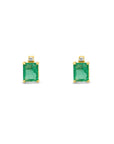 Emerald Stud Earrings with a diamond accent on a white background - Camille Jewelry