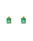 Emerald Stud Earrings with a diamond accent on a white background - Camille Jewelry