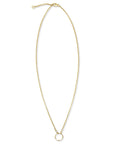 Gold circle necklace in 14K gold filled with bezel set cubic zirconia pendant on a white background by Camille Jewelry