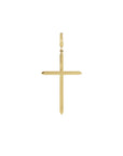 Gold cross charm in 14K yellow gold with knife edge design and clip bail on a white background by Camille Jewelry