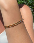 14k Gold Filled Large Elongated Curb Chain Bracelet on models arm by Camille Jewelry