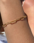 Gold Filled Paperclip Bracelet on models arm for display for Camille Jewelry