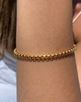 Gold Filled Rounded Box Chain Bracelet On Models arm - Camille Jewelry