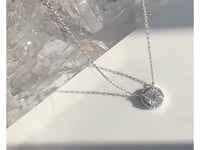 White gold solitaire necklace with halo on a thin chain rotating on a quartz stone | Camille Jewelry
