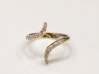 Bypass diamond pinky ring in 14k yellow gold video | Camille Jewelry