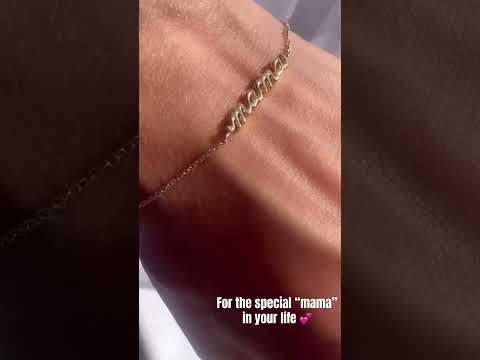 Model in video showing script mama bracelet in yellow gold color | Camille Jewelry