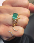 Skinny Trillion Ring – Dainty Women’s Jewelry in Gold Vermeil paired with other rings on a closed fist- Camille Jewelry
