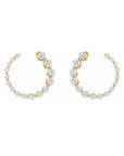 Small diamond hoop earrings in 14K yellow gold on a white background - Camille Jewelry