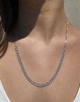 Sterling Silver Pave Curb Link Chain Necklace worn as a long style on a models neck–Camille Jewelry