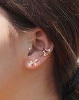 Gold Vermeil Double Trillion Ear Cuff on models ear– Semi-Fine Jewelry - Camille Jewelry