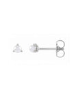 Tiny pearl stud earrings in 14K white gold on a white background by Camille Jewelry