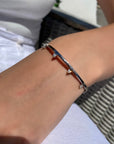 Trillion Cuff Bracelet – Edgy Bangle in Gold Vermeil on models wrist- Camille Jewelry