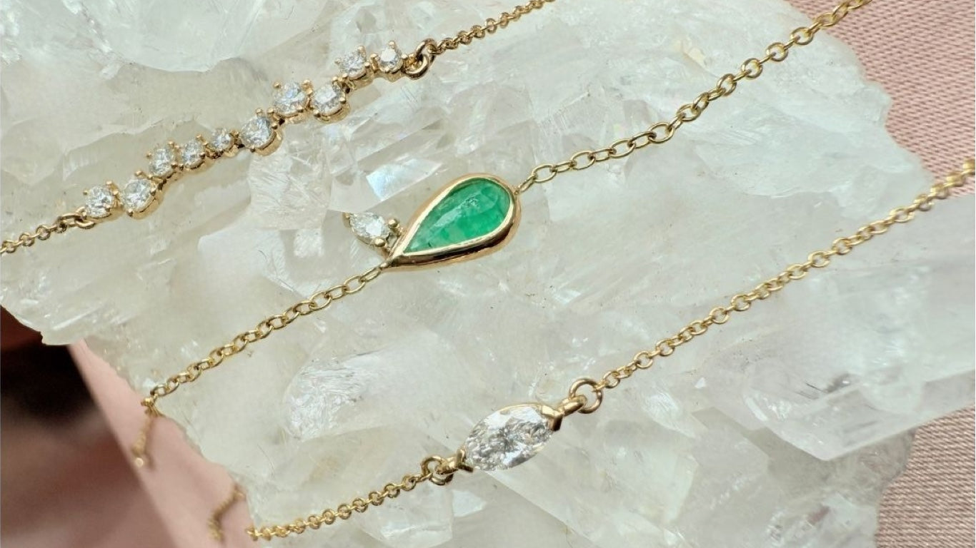 Fine Jewelry rings with diamonds and gemstones on model by Camille Jewelry