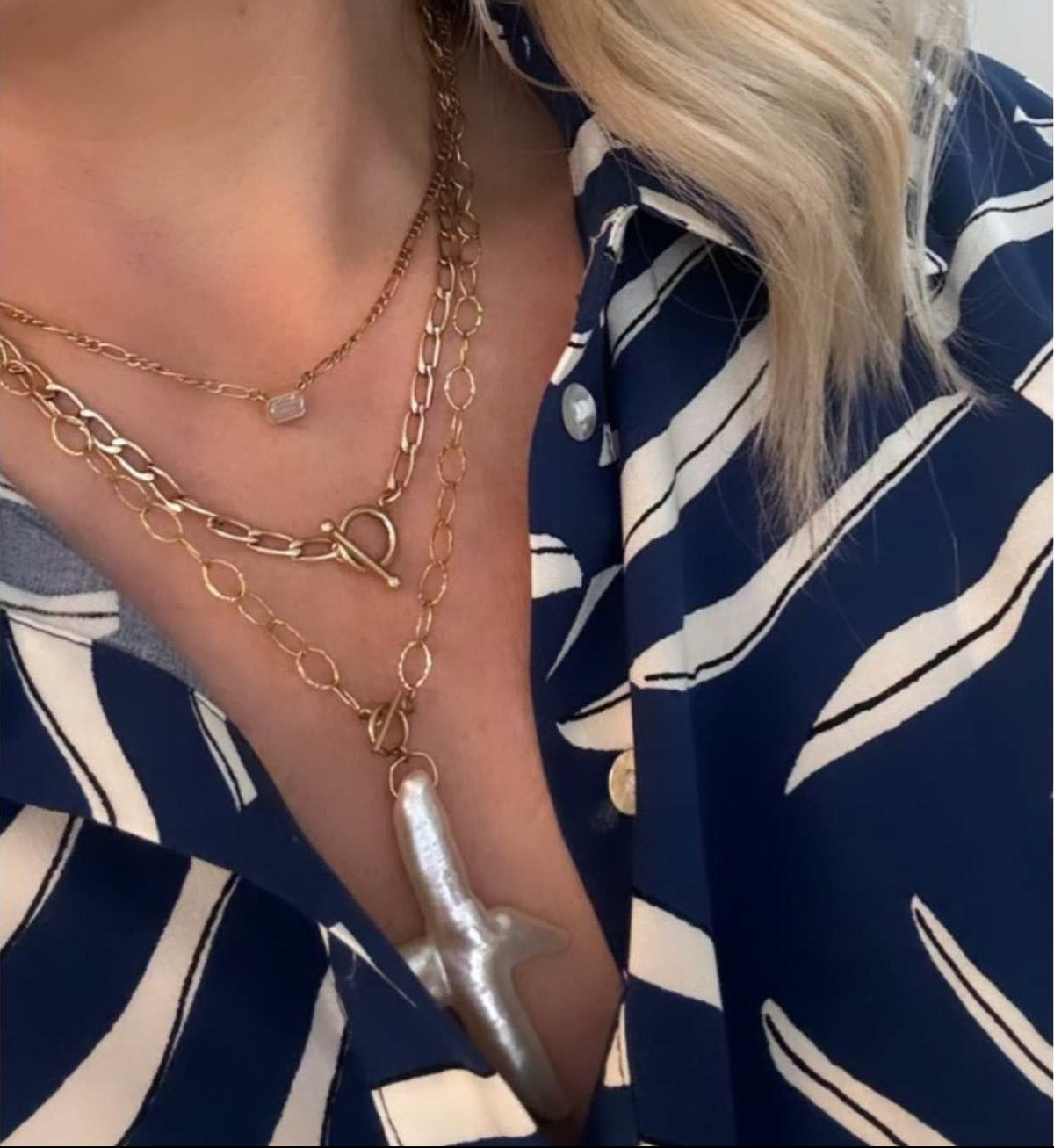 gold filled curb chain necklace and freshwater pearl cross necklace on woman's necklace - Camille Jewelry
