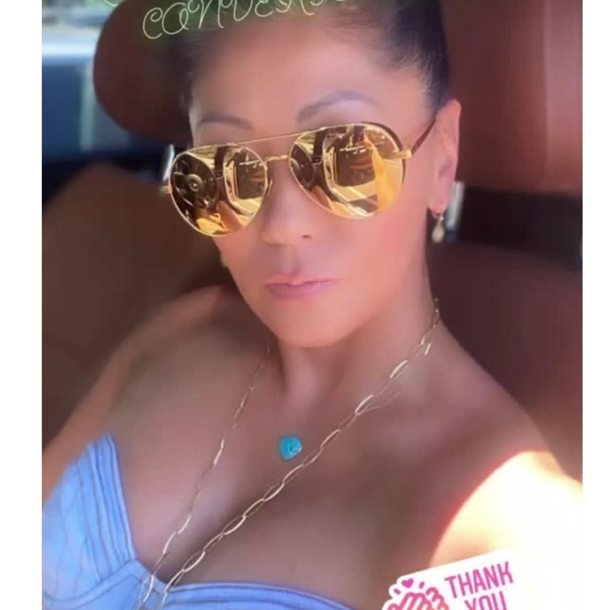 gold chain necklace on woman posing - Camille Jewelry