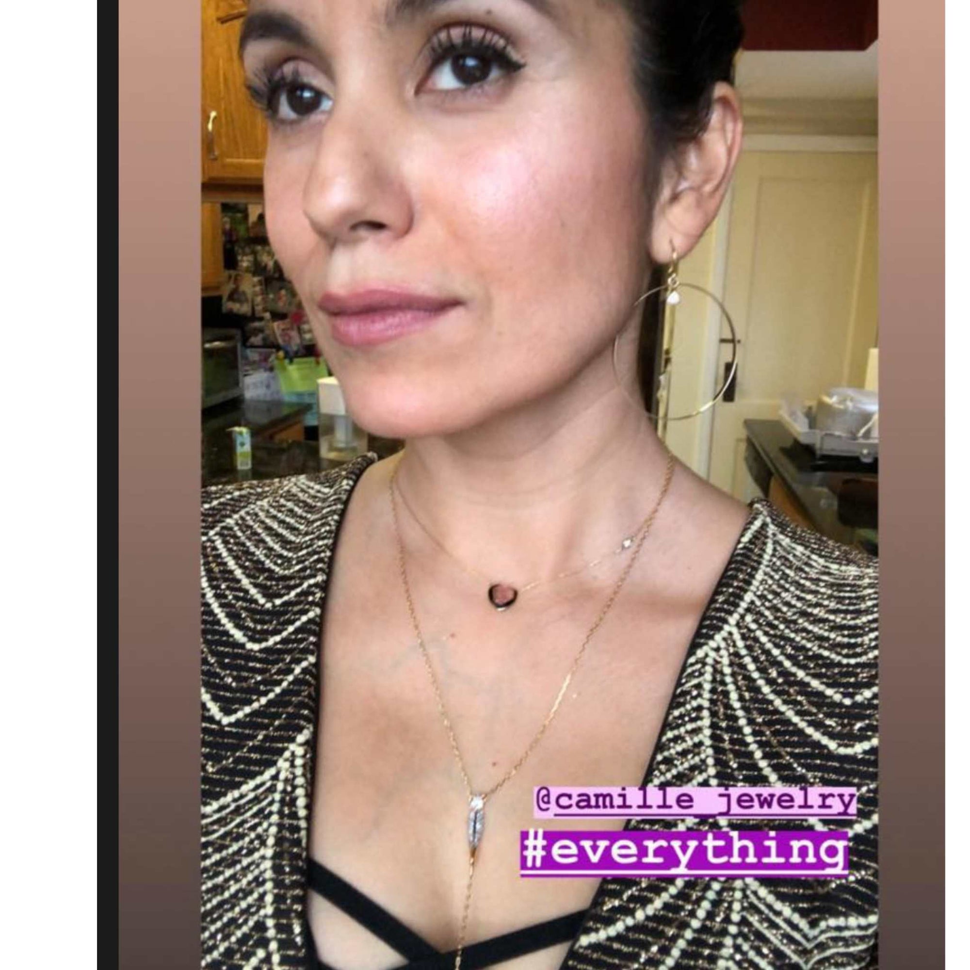 layered gold filled earrings and necklaces on customer - Camille Jewelry