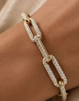Gold paperclip bracelet in 14K yellow gold in lab created diamonds on wrist by Camille Jewelry