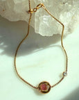gold filled bracelet in pink rose cut tourmaline with cz accent.