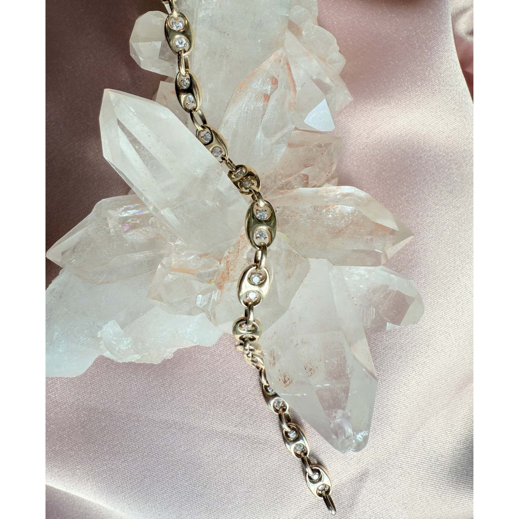 Mariner bracelet with lab created diamonds on a soft pink background on a quartz display - Camille Jewelry