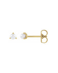 tiny pearl studs in 14K yellow gold on a white background by camille Jewelry