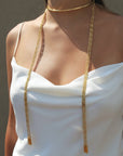 Anuket Gold Scarf Necklace – Versatile Layered Fashion Jewelry on models neck- Camille Jewelry