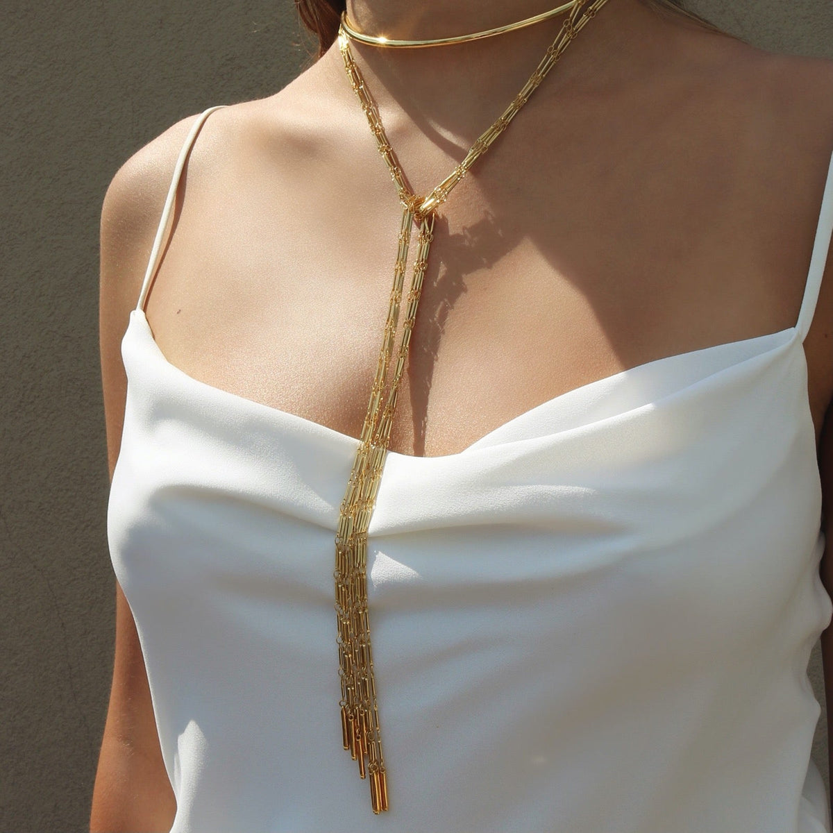 Anuket Gold Scarf Necklace knotted chains to front on model– Versatile Layered Fashion Jewelry - Camille Jewelry