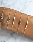 Diamond Bar Bracelet – 14K Gold Pavé Fine Jewelry on models arm with other bracelets - Camille Jewelry