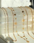 Gold plated Convertible Magnetic Necklaces on a quartz display - Camille Jewelry