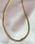  gold filled curb chain link necklace in 14K gold filled on soft pink cloth by Camille Jewelry