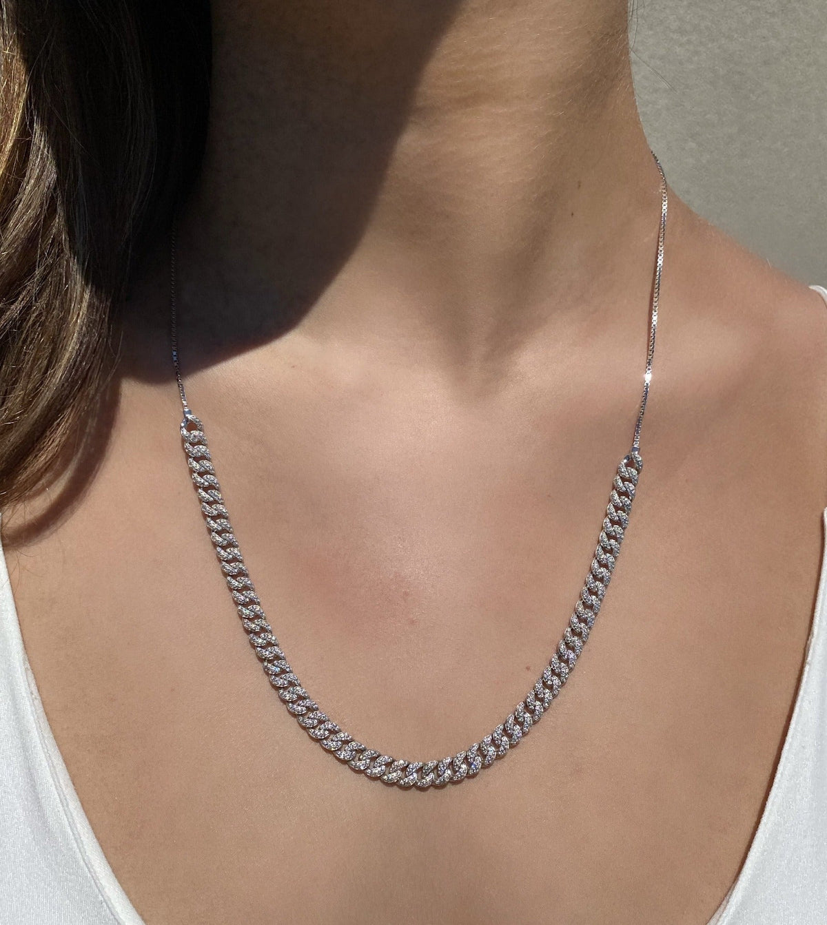 Sterling Silver Pave Curb Link Chain Necklace worn as a long style on a models neck–Camille Jewelry