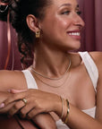 Diamond Tennis Necklace | 5.87 CTW Lab-Created or Natural Diamonds on a model posing - Camille Jewelry
