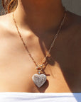 Druzy Quartz Heart Pendant Necklace on a model by Camille Jewelry