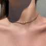 Gold Filled Medium Elongated Curb Chain Necklace on models neckline by Camille Jewelry