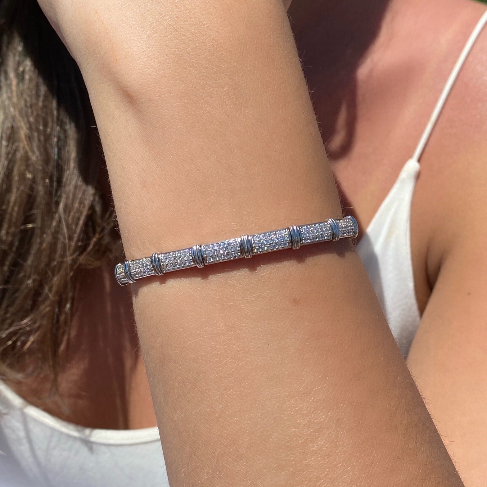 Sterling Silver Flexible Pave Bangle on models wrist- Camille Jewelry