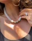 Woman wearing a freshwater pearl collar necklace with 14K gold filled beads by Camille Jewelry