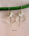 Close up of the hand wrapped faceted rondelle gemstone cluster on gold filled threader hoop earrings  small size by Camille Jewelry