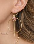Gold filled gemstone threader hoop earrings worn on a model showing the pull through drop and movement by Camille Jewelry