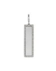 White gold bar charm in 14K white gold with a natural diamond border on a white background by Camille Jewelry