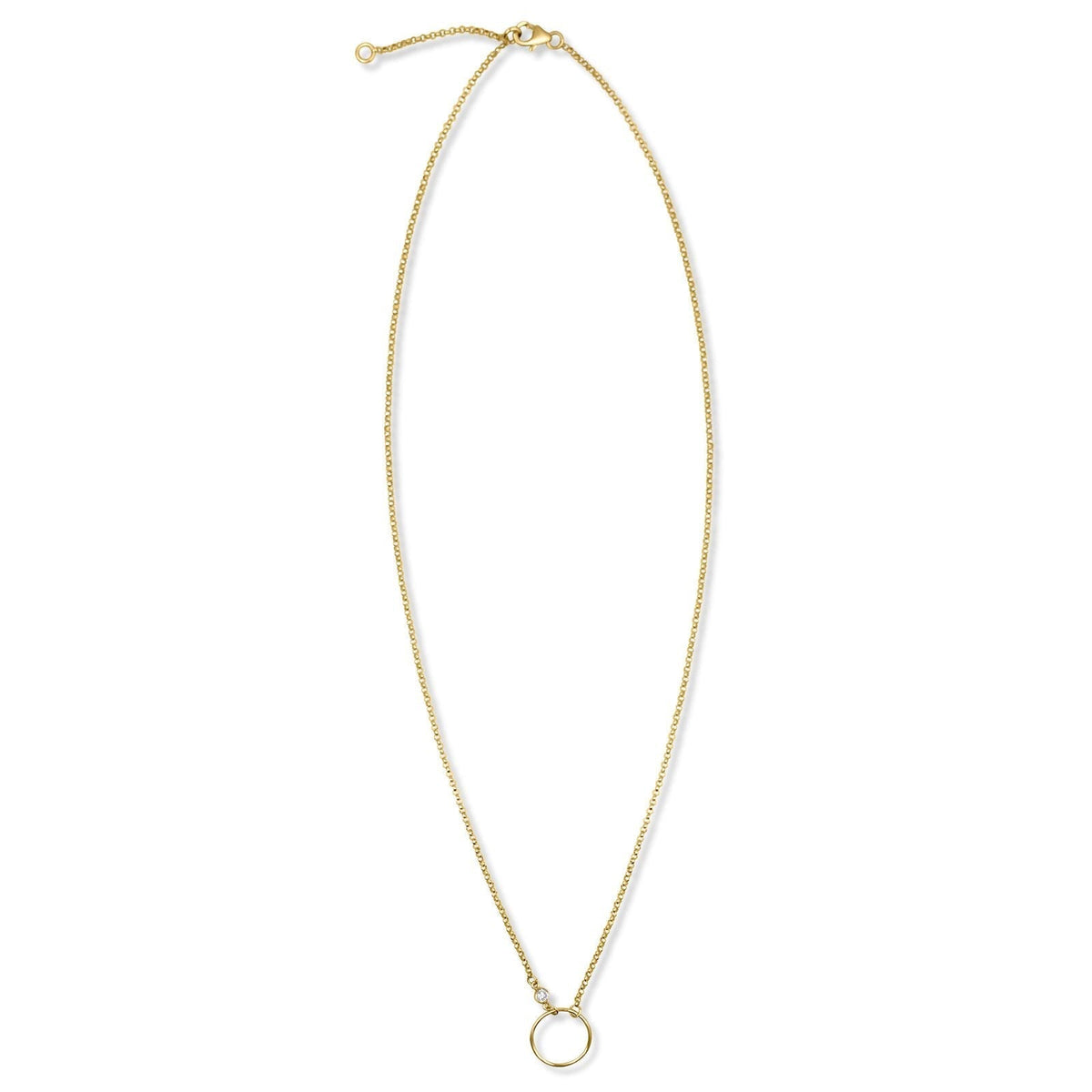 Gold circle necklace in 14K gold filled with bezel set cubic zirconia pendant on a white background by Camille Jewelry