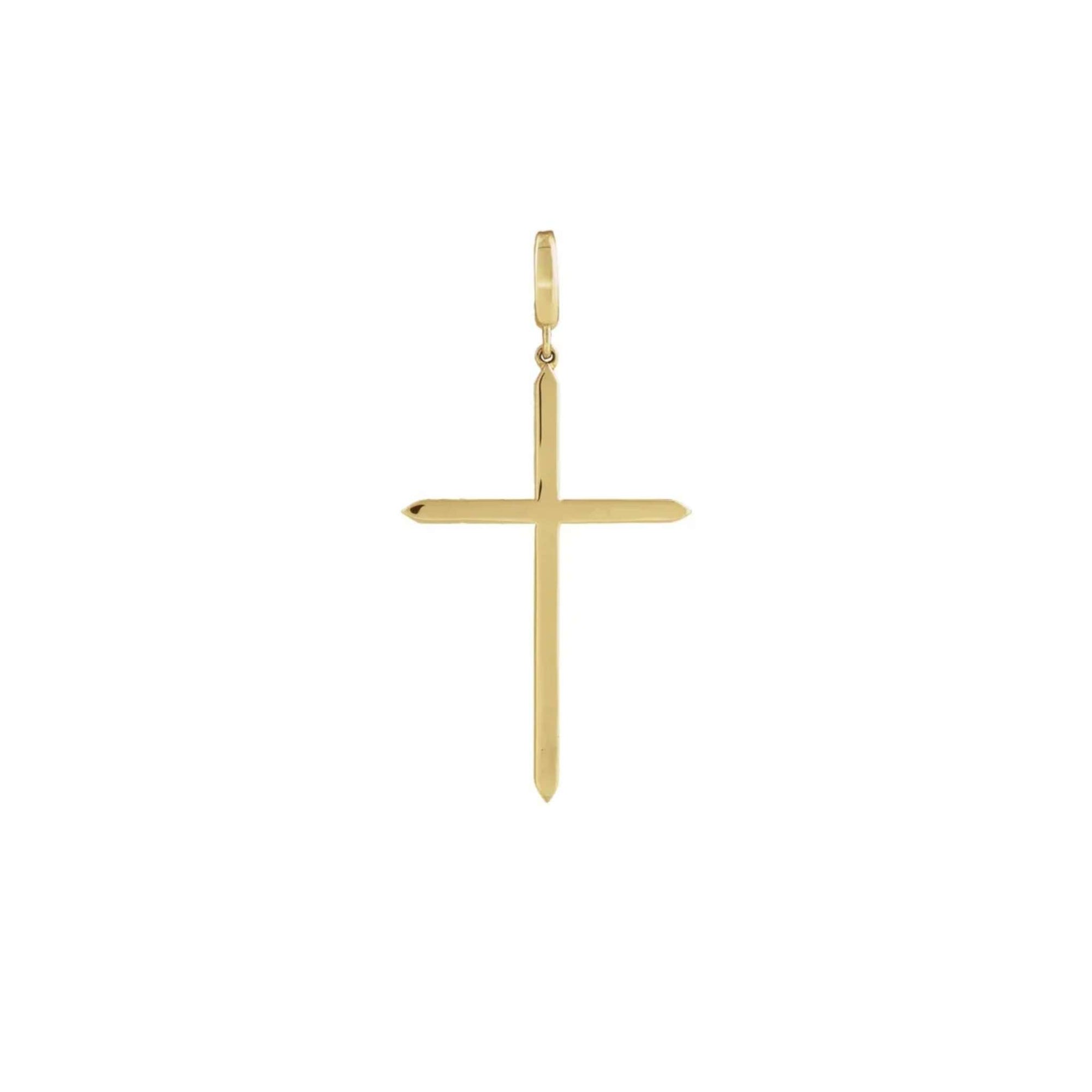 Gold cross charm in 14K yellow gold with knife edge design and clip bail on a white background by Camille Jewelry